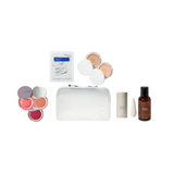 Collection of cosmetic products including a white pouch, bottles, and makeup items on a white background
